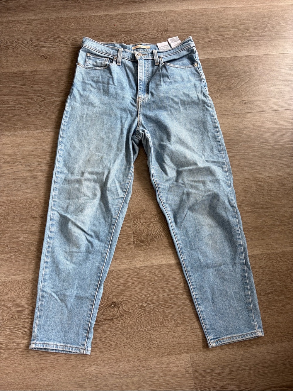 Levi’s high waisted tapered blue denim jeans